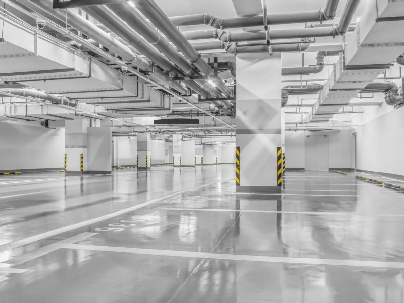 Empty space car park interior at night